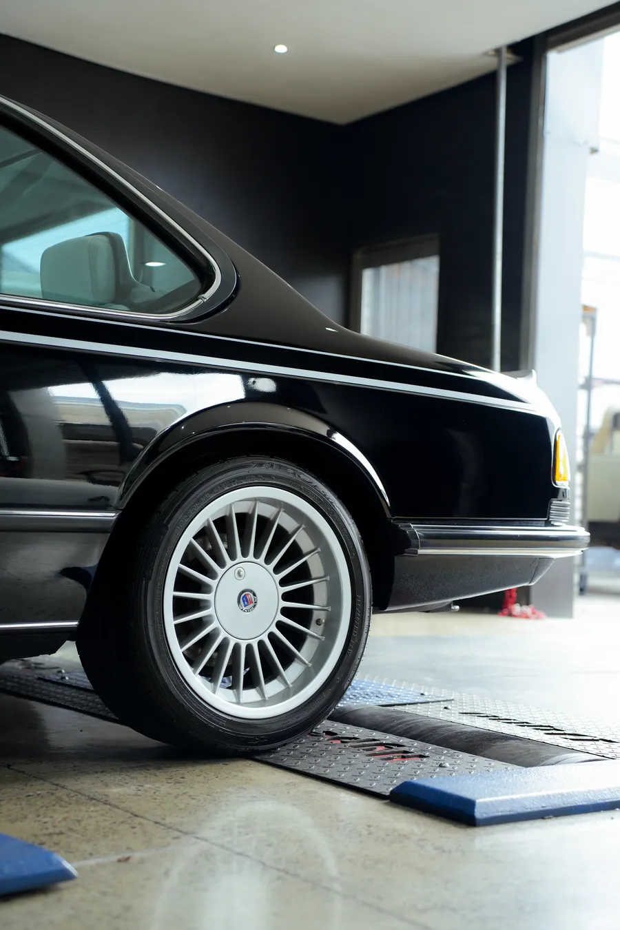Classic black BMW 6-series on Alpina wheels