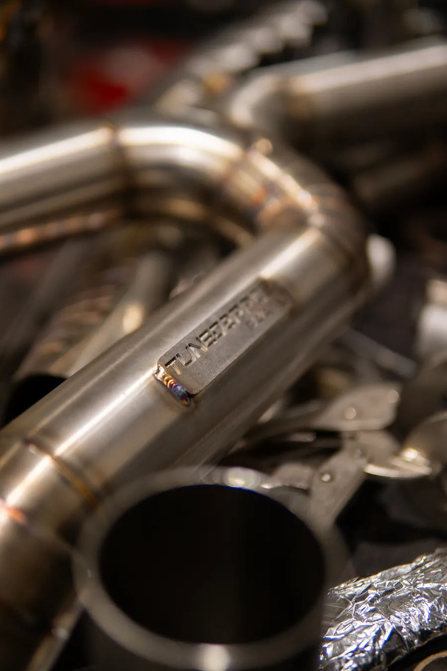Stainless exhaust bends fabricated for a Porsche 997 Turbo