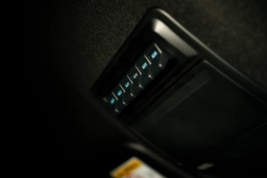 Backlit switch panel in a dark cabin